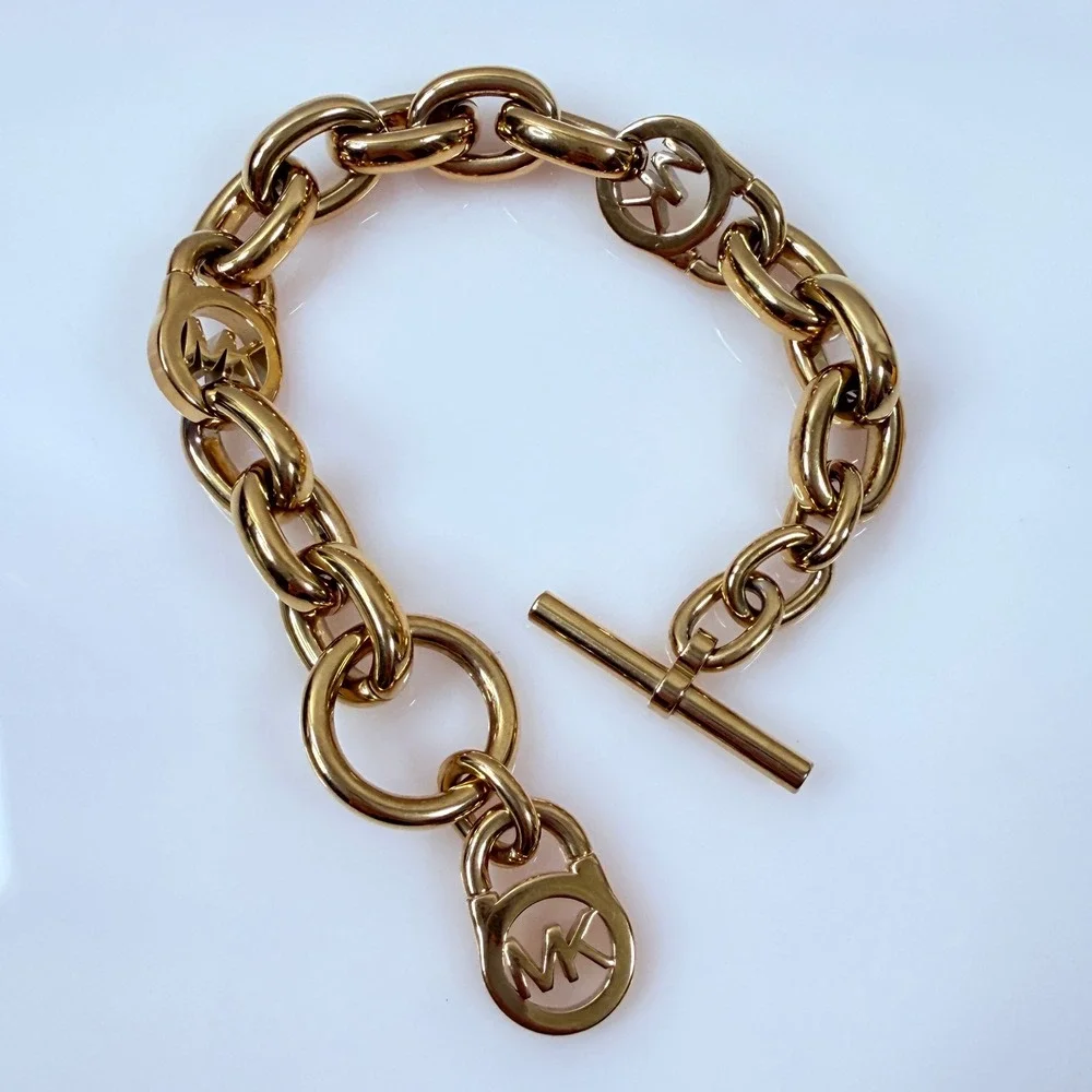 Michael Kors Gold Tone Chunky Chain Bracelet MK Logo Toggle Clasp 6.5